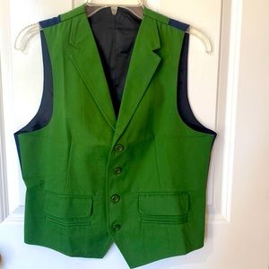 Green vest and dress shirt.